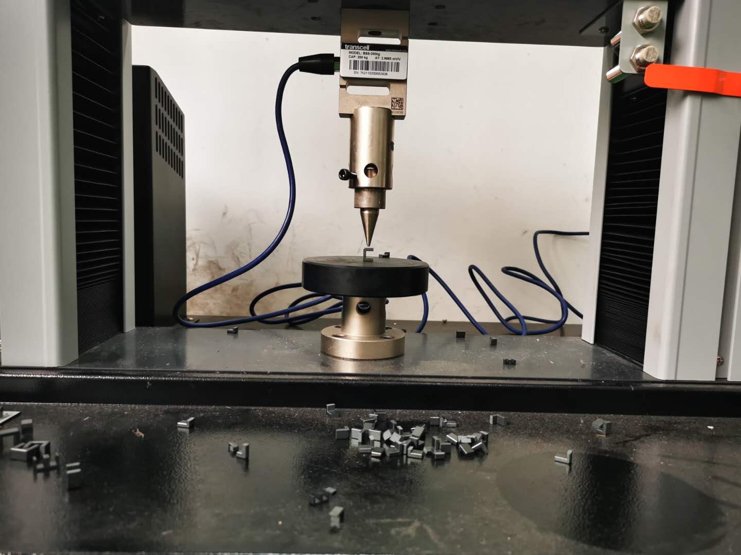 Magnetic compression and flexural testing machine